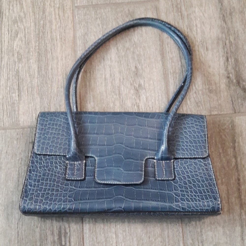 Cool looking blue Tommy Hill figure purse